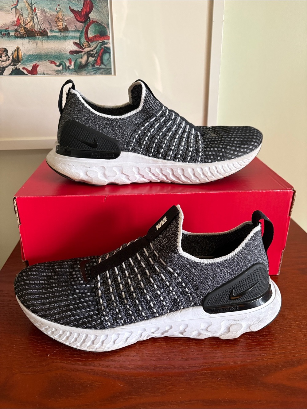 Nike Women's Black/White Slip-On Knit Running Shoes